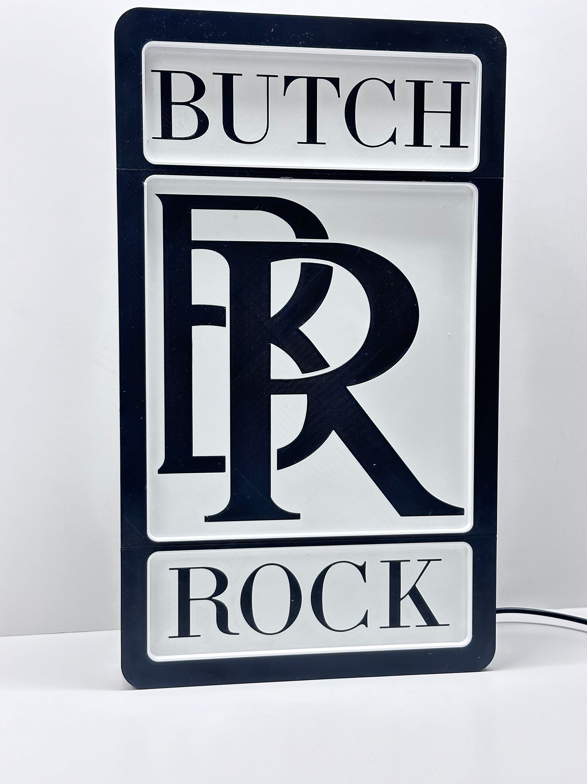 Butch rock sign in black and white