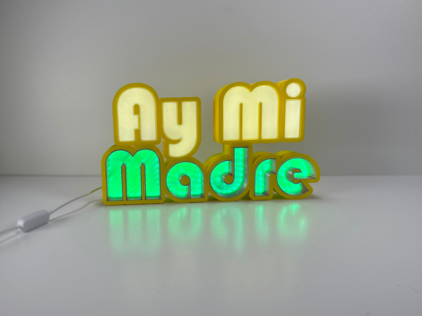 Ay Mi Madre sign lit up