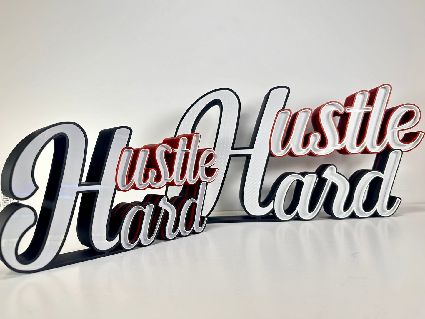 Medium and large hustle hard sign