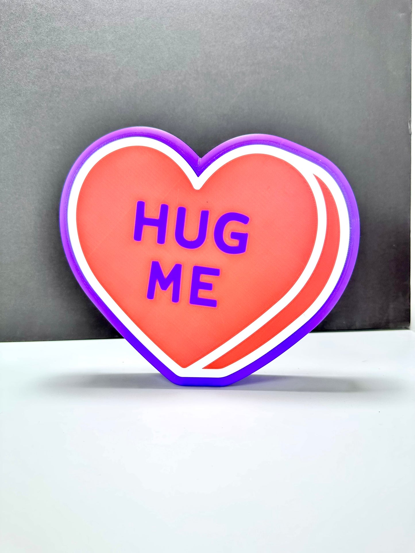 Purple LED heart sign with 'HUG ME.' Perfect customizable Valentine’s gift.