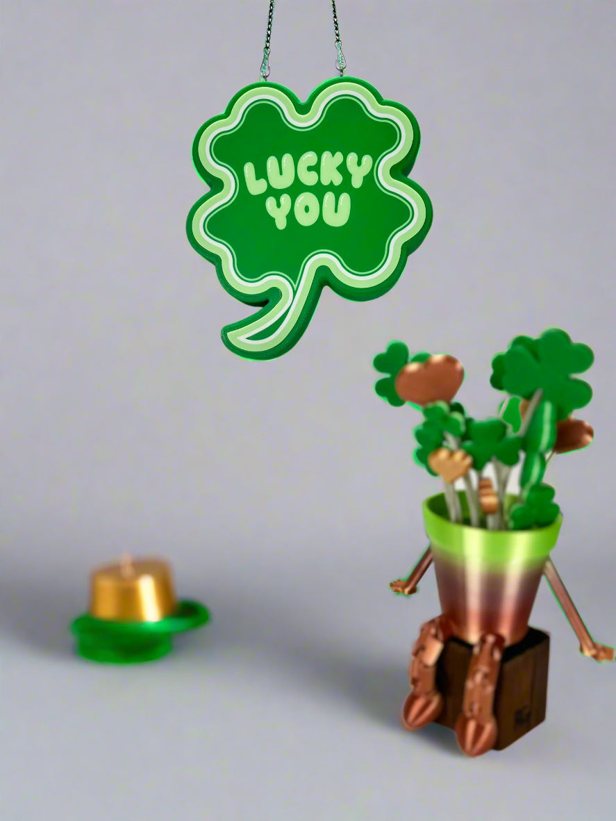Hanging Shamrock LED sign with metal chain, perfect for St. Patrick’s Day decor