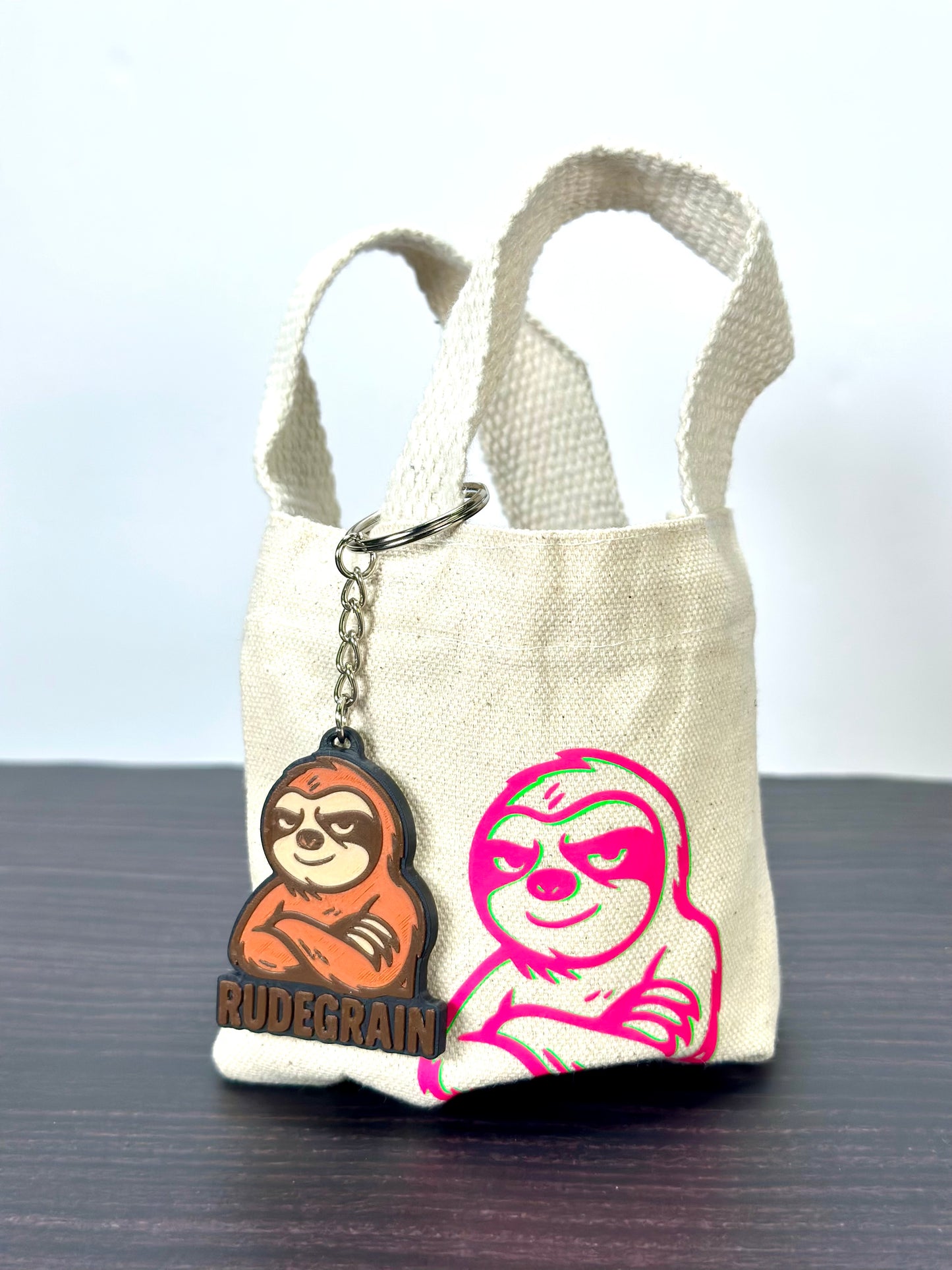 RudeGrain Sloth Logo Keychain – Limited Merch Accessory