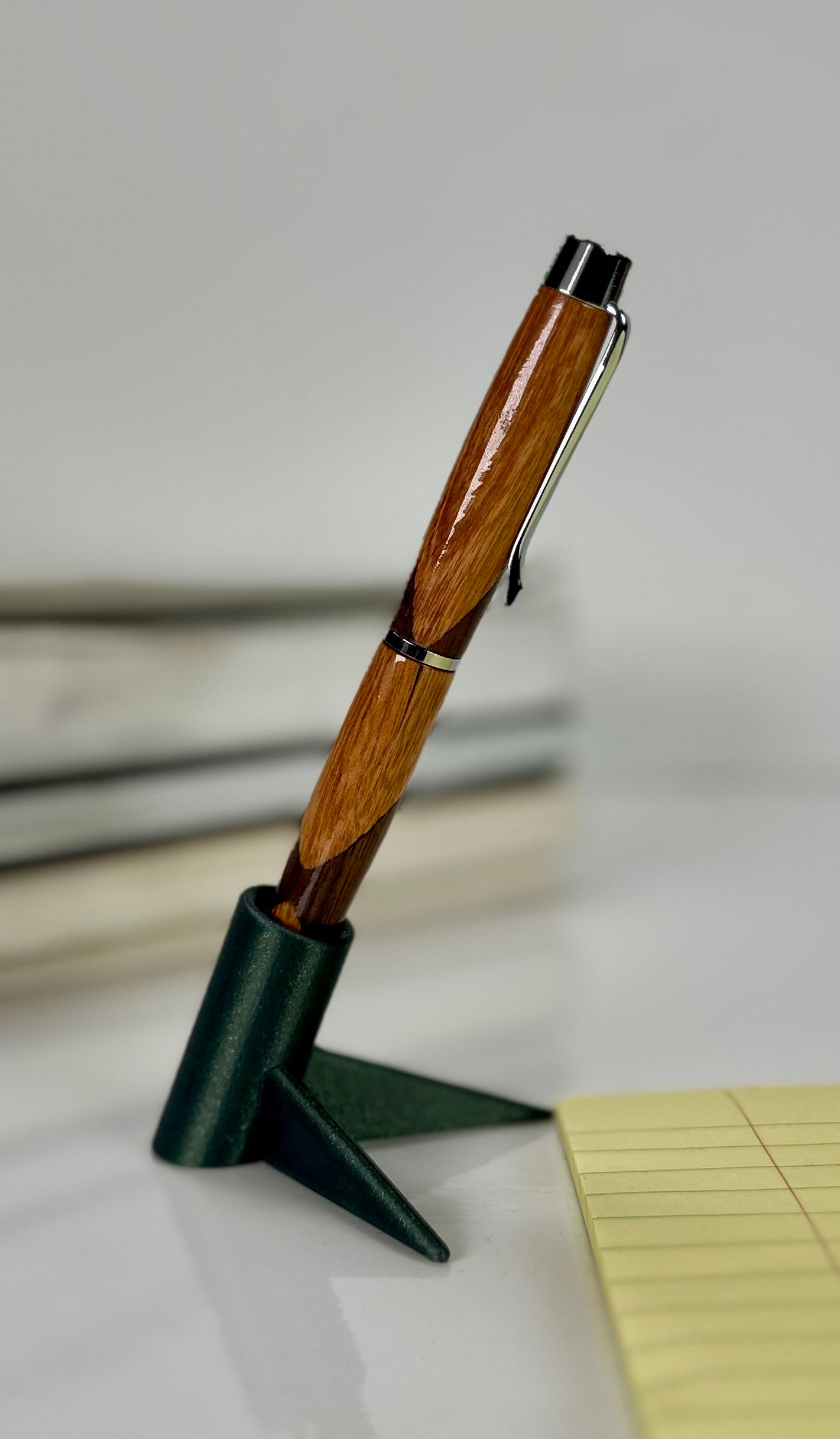Close-up of cherry/walnut swirl pattern on handmade wooden pen