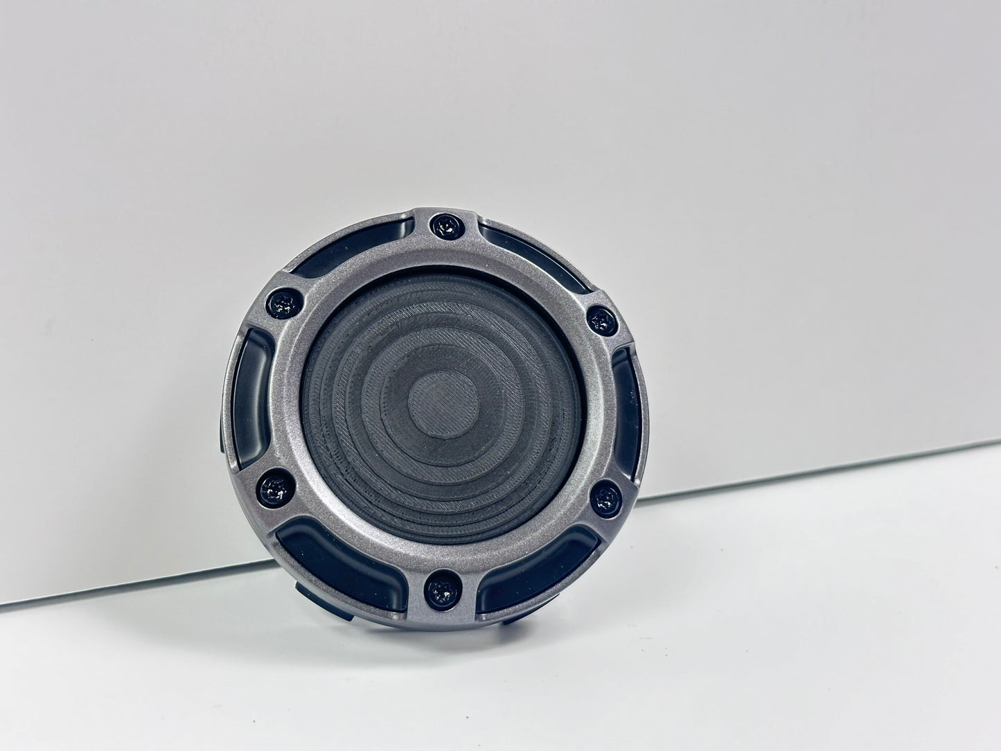 Angled view of the assembled Fuel Wheel Floating Center Cap, highlighting the 3D printed parts and overall construction.