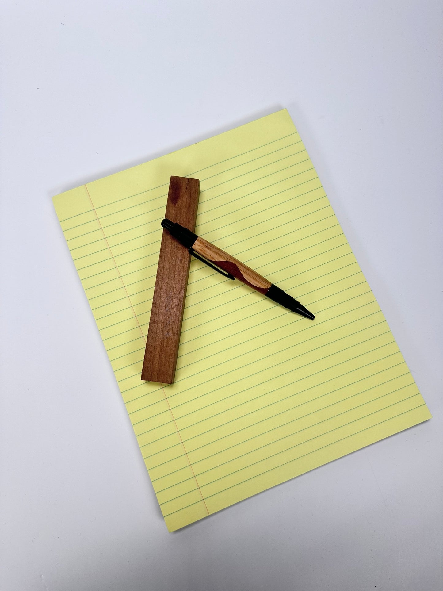 Horizontal display of pen on a wooden block