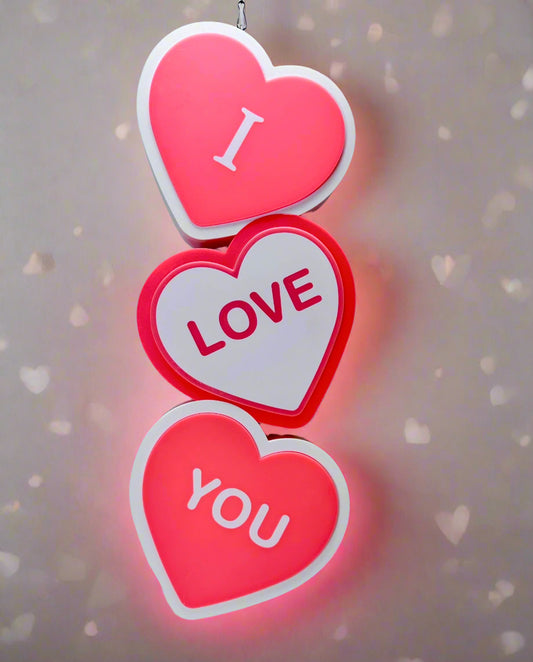 Hanging I Love You LED Sign with heart-shaped layers, romantic lighting